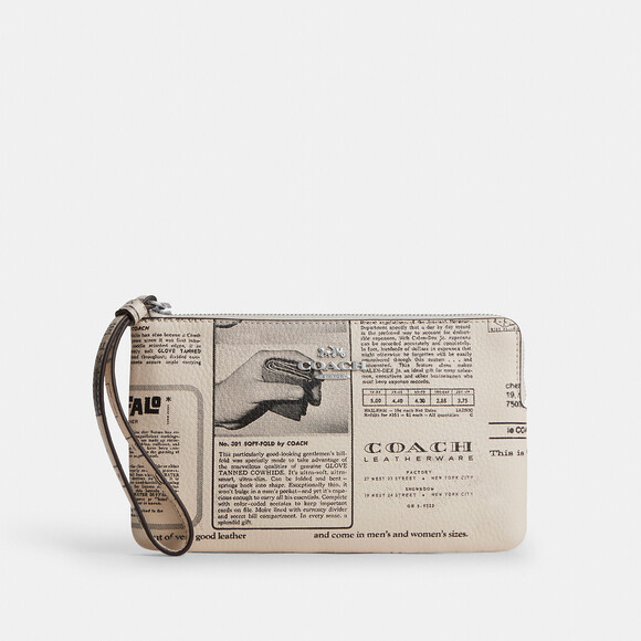 Coach Handbags - Coach Outlet Large Corner Zip Wristlet With Newspaper Print